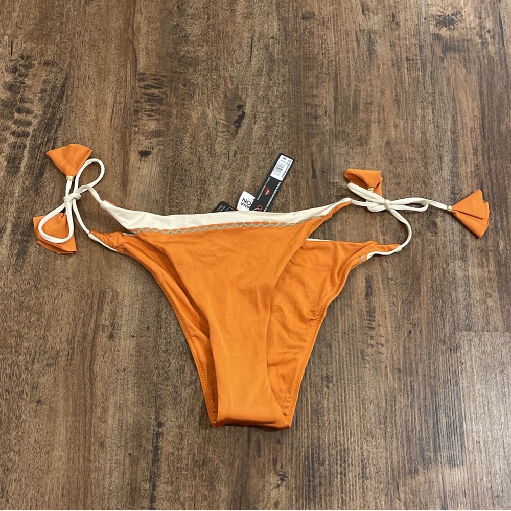 Orange swim suit bottoms. Brand new - never worn